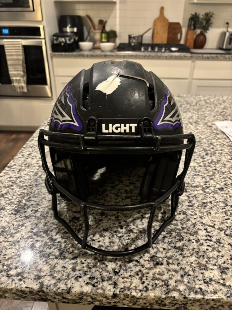 LIGHT Apache Lightning Youth Football Helmet that was cracked at practice
